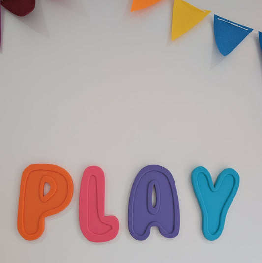 Colorful 'PLAY' letters with a banner on a white background