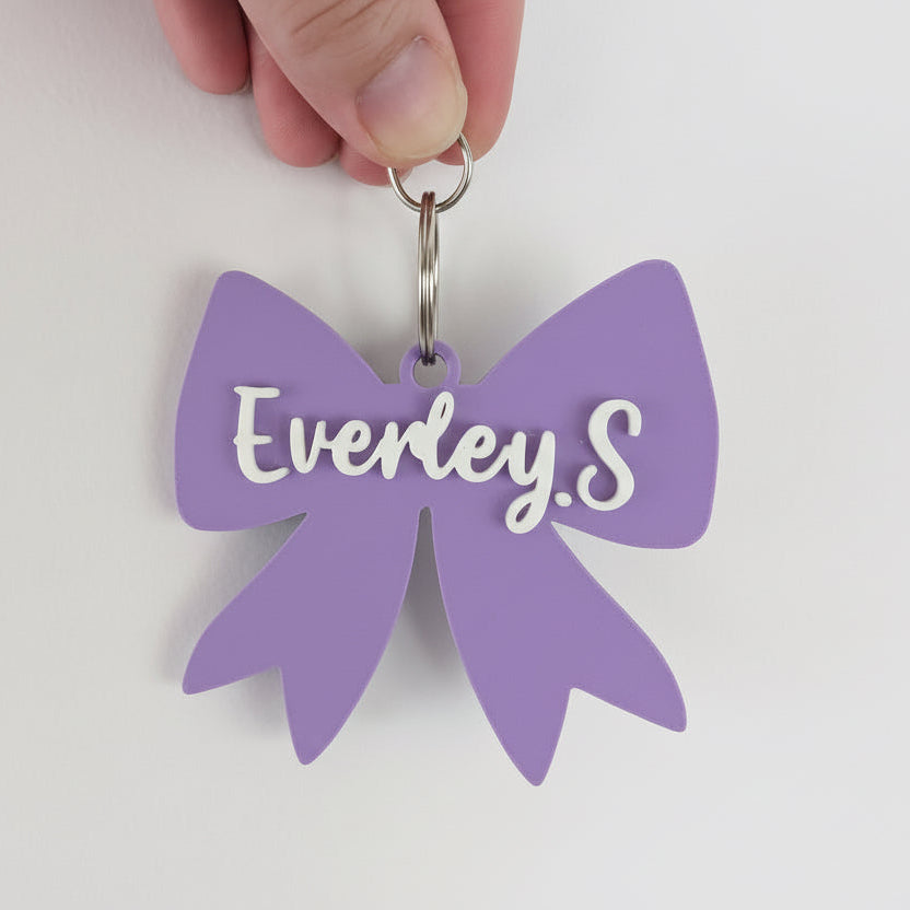 purple bow keychain with personalised everley.s