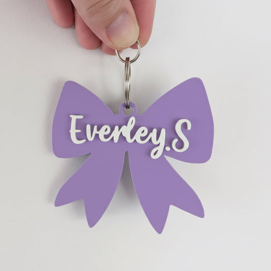 purple bow keychain with personalised everley.s