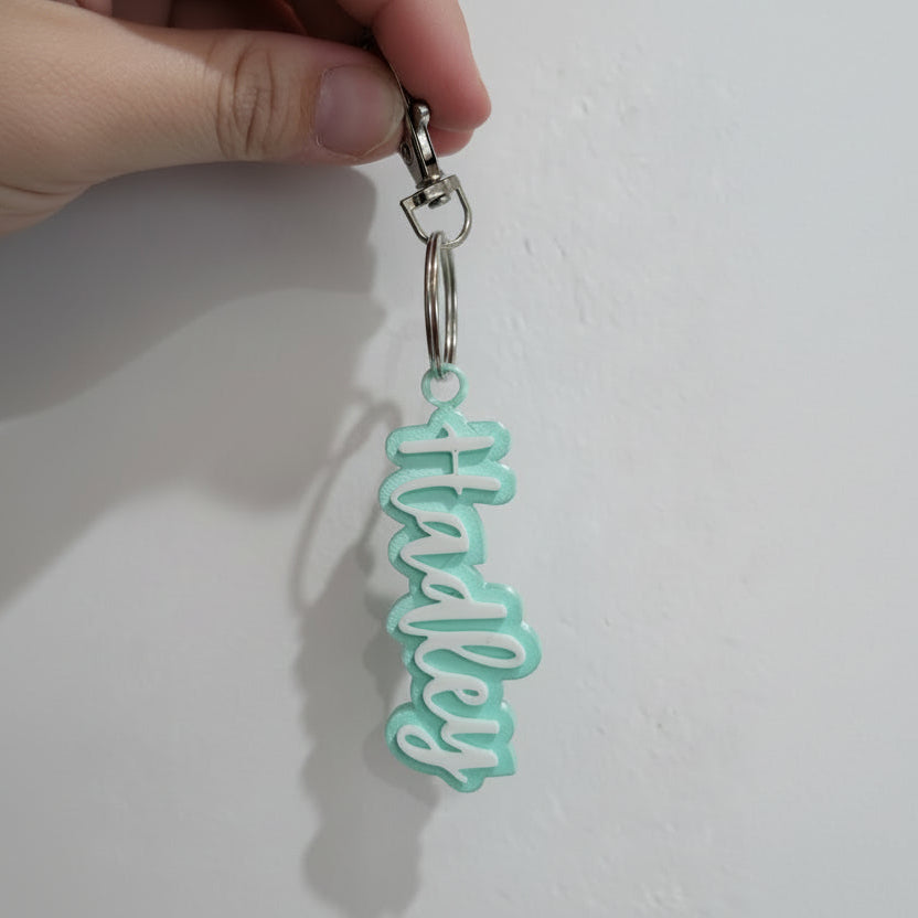 Keychain with 'Hadley' text on a white background